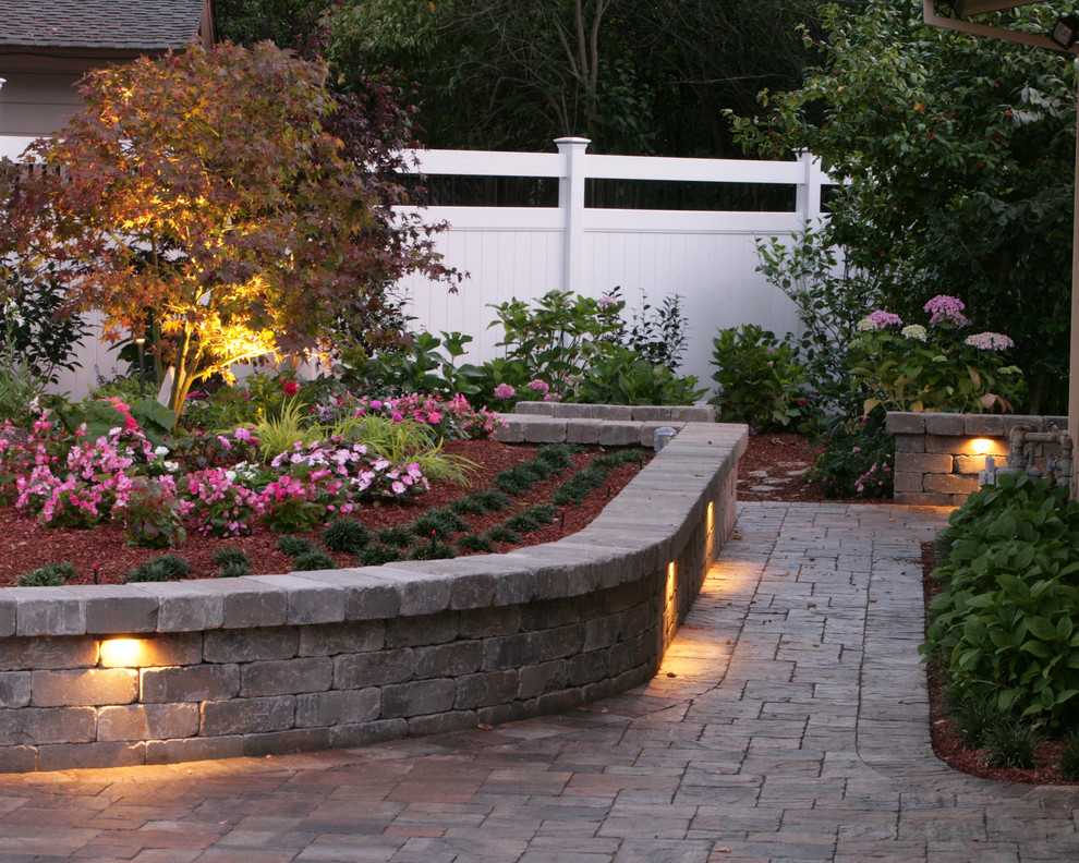 Design ideas for a mid-sized transitional full sun backyard stone landscaping in San Francisco for spring.