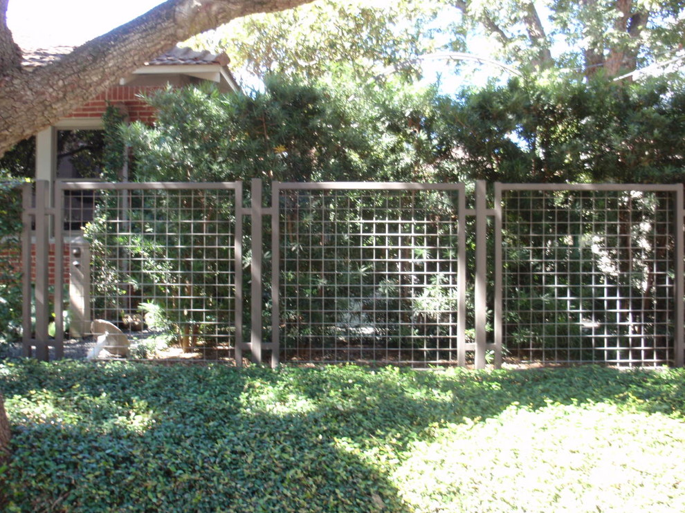 Metal Arbor, fencing and koi pond Transitional Landscape Houston