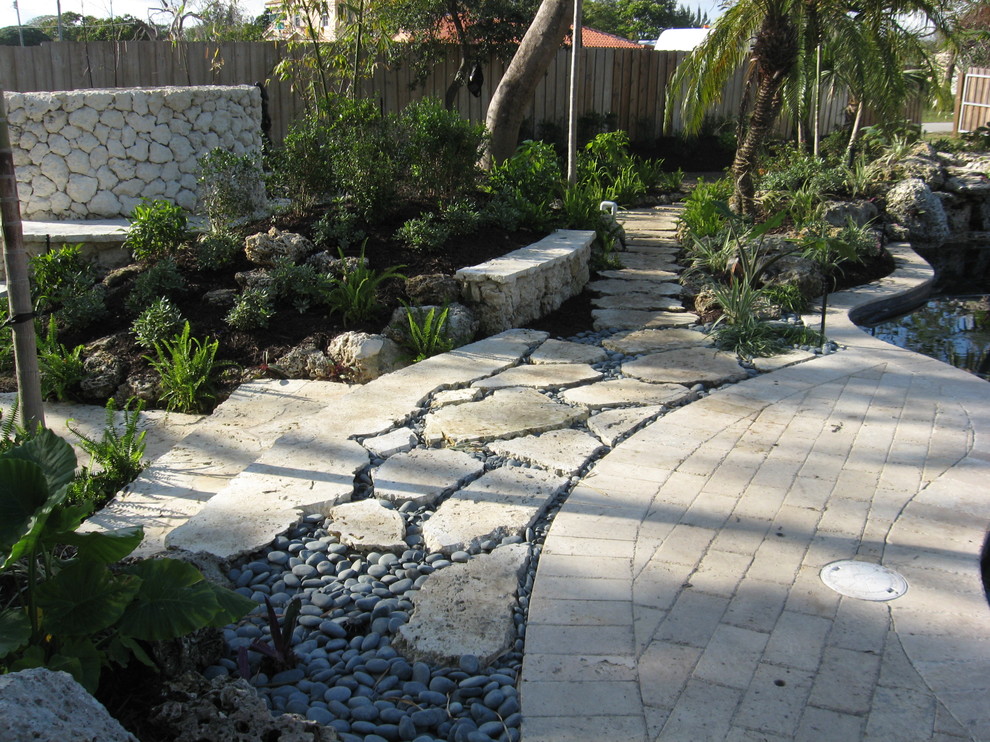 World-inspired back fully shaded garden in Miami.