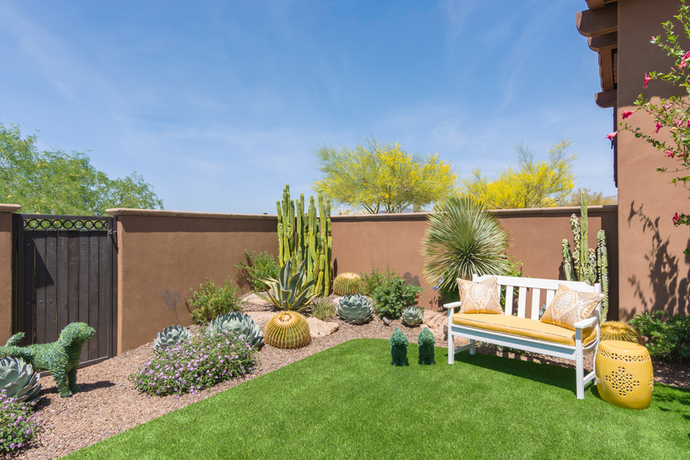 Design ideas for a small southwestern full sun side yard landscaping in Phoenix.