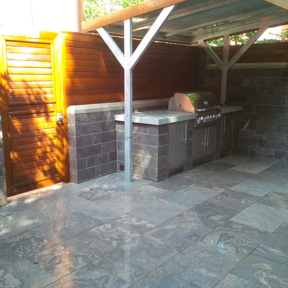 Inspiration for a small modern shade courtyard stone outdoor sport court in Toronto.