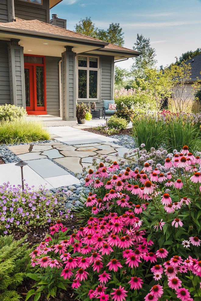 Inspiration for a mid-sized craftsman drought-tolerant and full sun front yard stone garden path in Milwaukee for summer.