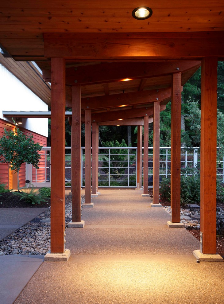 Inspiration for a farmhouse shade side yard concrete paver garden path in Portland.