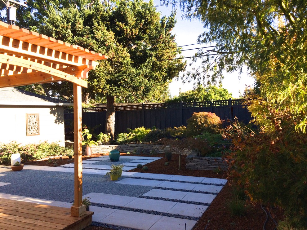Inspiration for a small asian partial sun backyard concrete paver retaining wall landscape in San Francisco for summer.