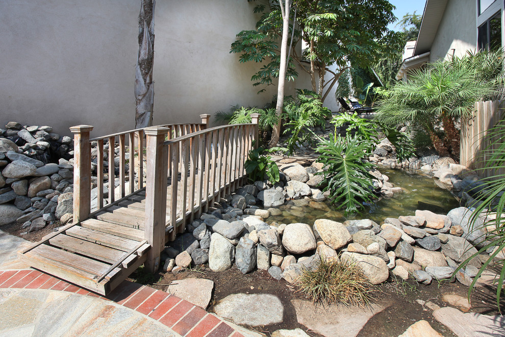 Design ideas for a tropical landscaping in Orange County.