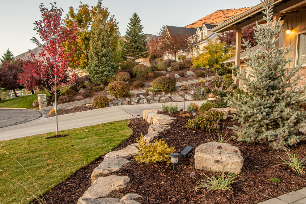 Design ideas for a small traditional full sun front yard stone walkway in Salt Lake City for summer.