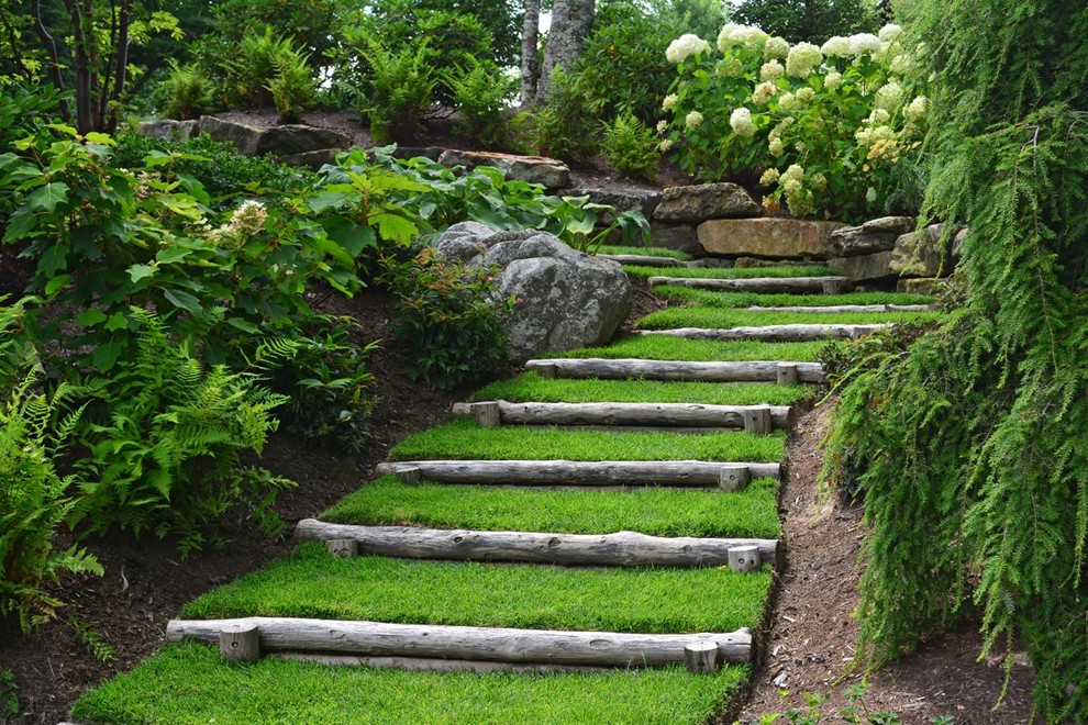 Design ideas for a large traditional partial sun hillside garden path in Other.