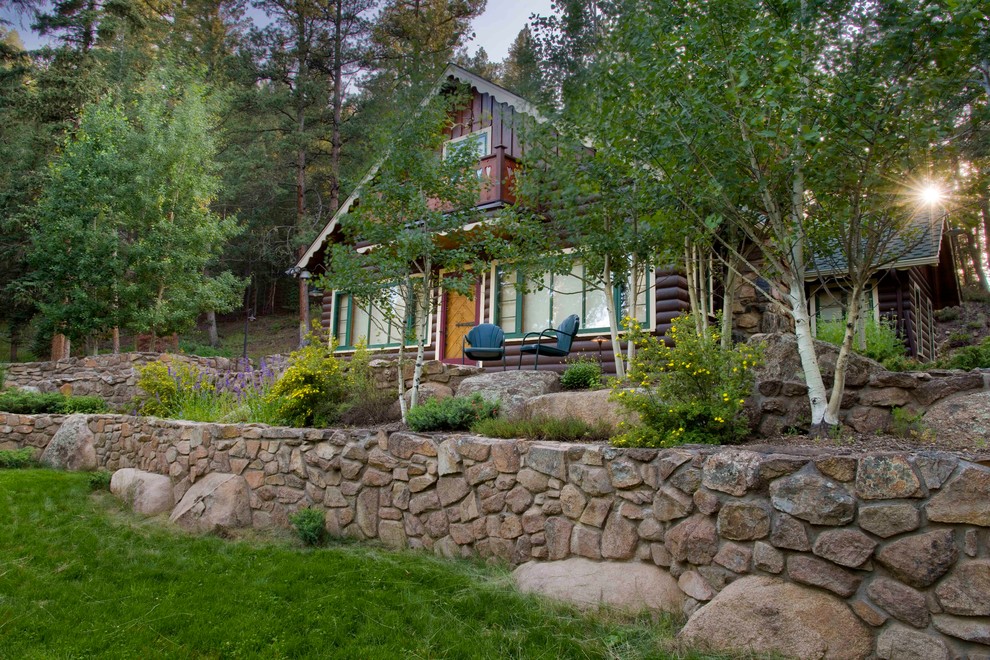 Inspiration for a rustic landscaping in Denver.