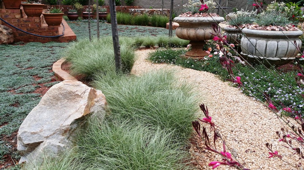 Design ideas for a rustic landscaping in Other.