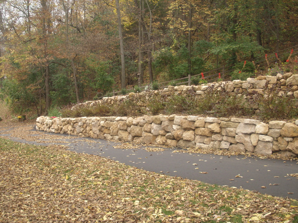 Natural Limestone boulder retaining wall with built in stairway