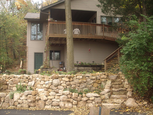 Natural Limestone boulder retaining wall with built in stairway