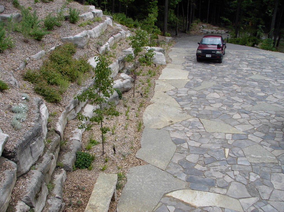 Natural Stone Driveway and Hillside Terraces Contemporary Landscape Toronto by Genus