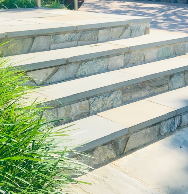 New Driveway with retaining wall and walkway with steps with landings