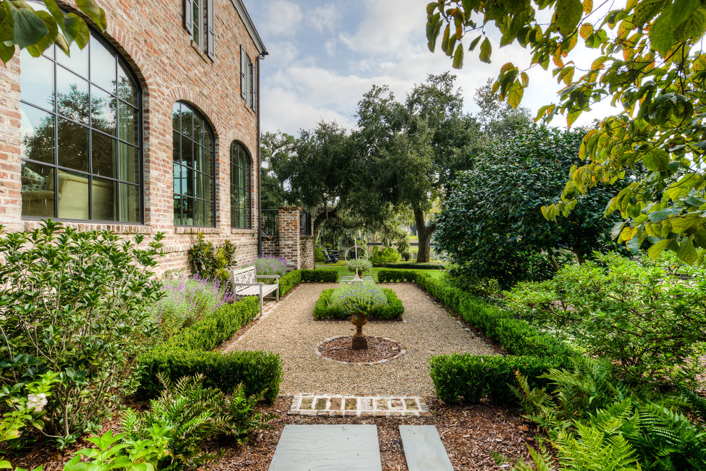 Traditional formal full sun garden in Charleston.