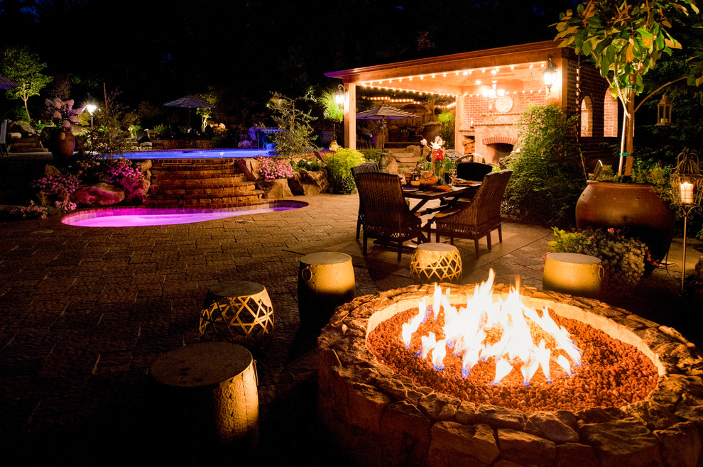 Design ideas for a large mediterranean shade concrete paver landscaping in Portland for spring.