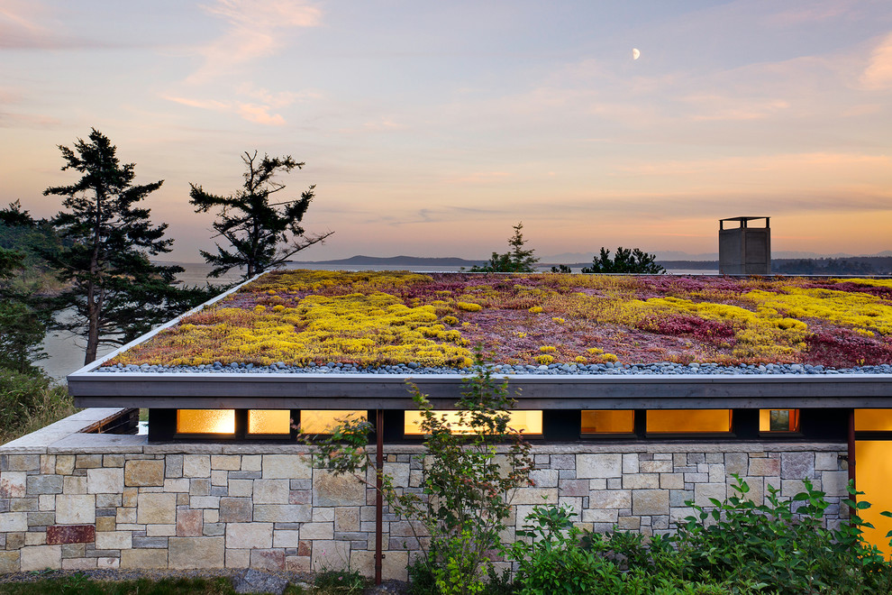 Diseño de jardín contemporáneo de tamaño medio en azotea con exposición total al sol y gravilla