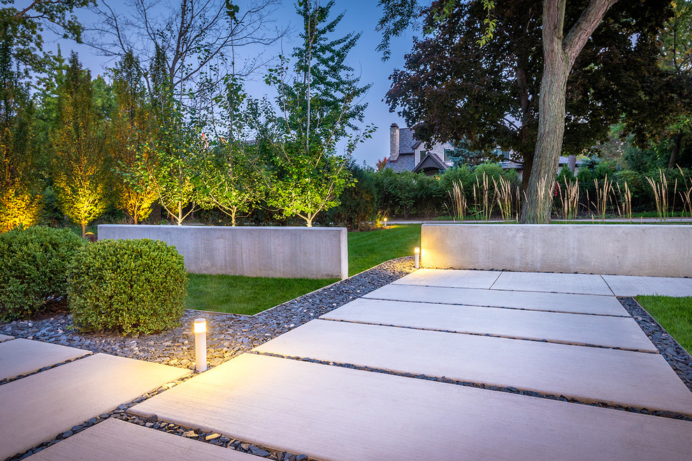 Design ideas for a contemporary front yard concrete paver garden path in Chicago.