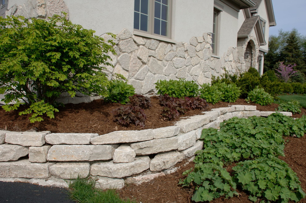 Oakfield stone Traditional Landscape Chicago by EdenValders