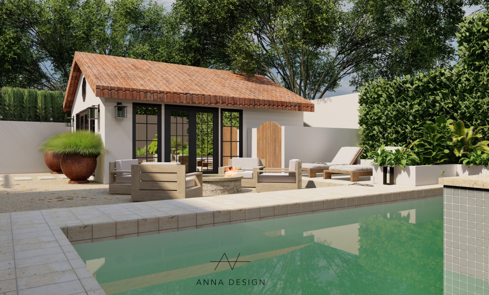 Ispirazione per un grande giardino formale mediterraneo esposto in pieno sole dietro casa in estate con un caminetto, graniglia di granito e recinzione in pietra