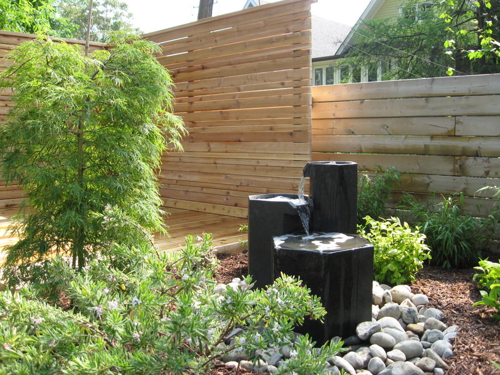 Inspiration for a modern landscaping in Toronto with decking.