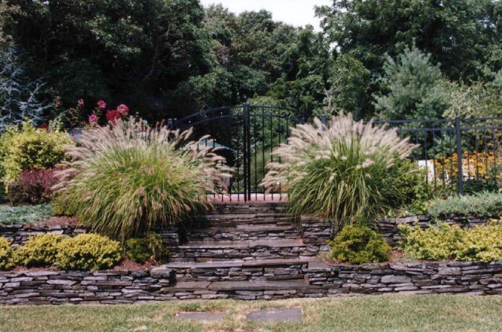 This is an example of a traditional backyard stone garden path in New York.