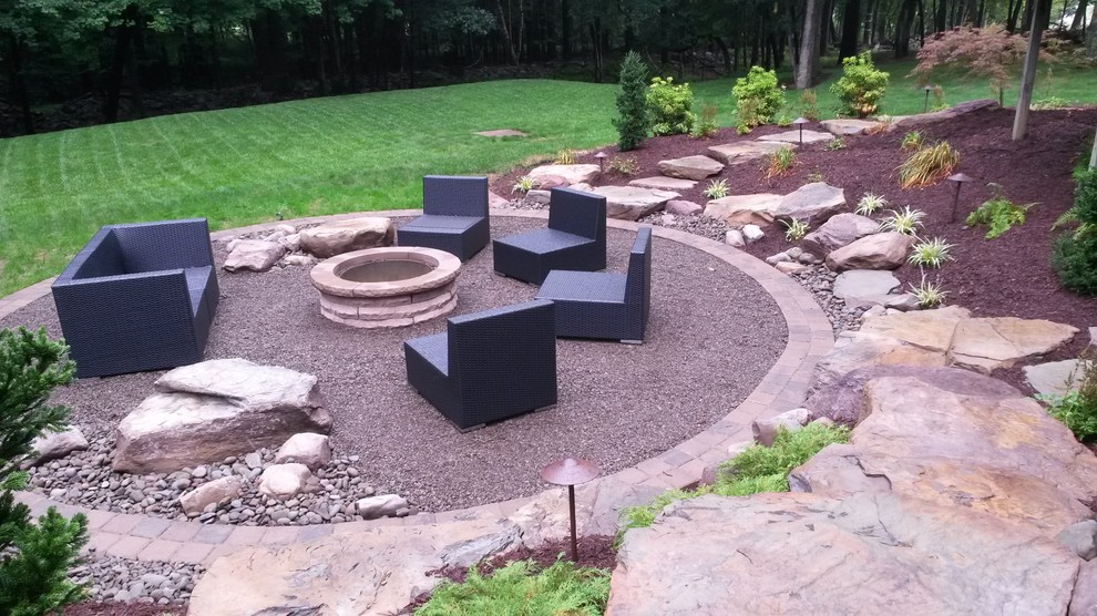 Design ideas for a medium sized traditional back garden in Other with a fire feature and gravel.
