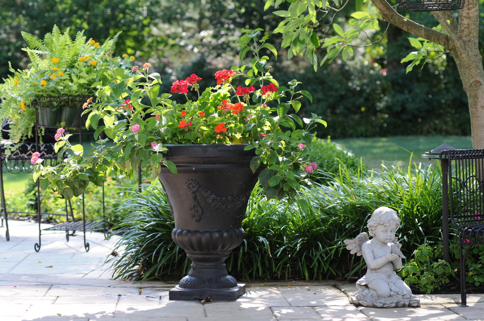 Photo of a classic garden in St Louis with a potted garden.