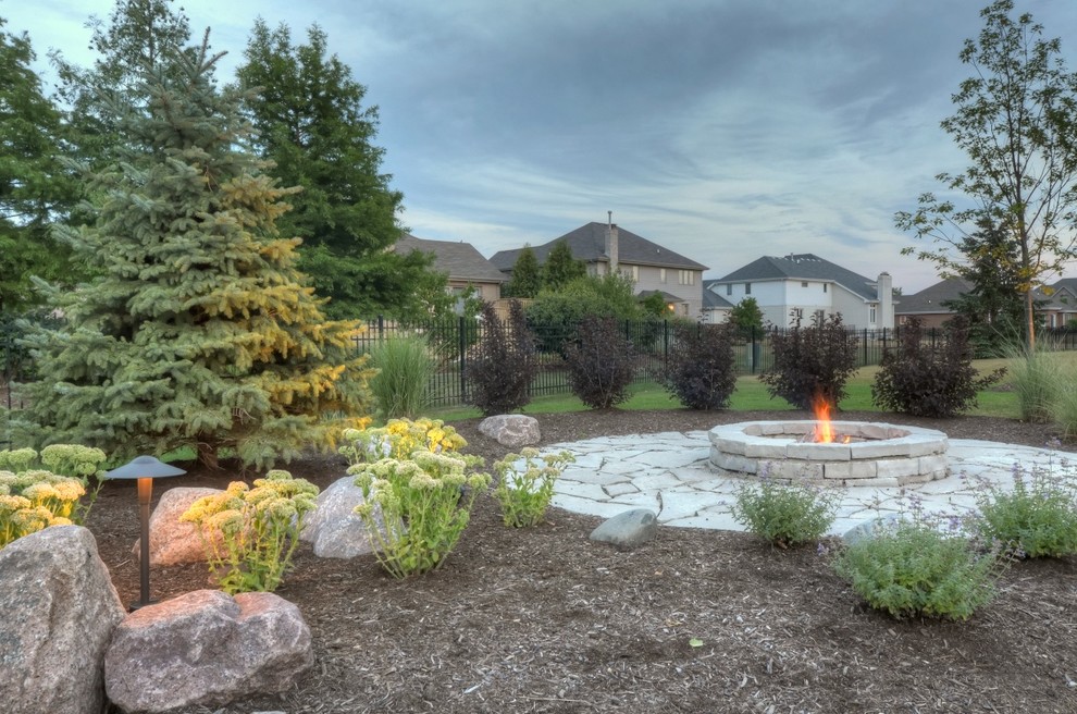 Outdoor Living with Curved Bar, Fire Pits, and Custom Stools