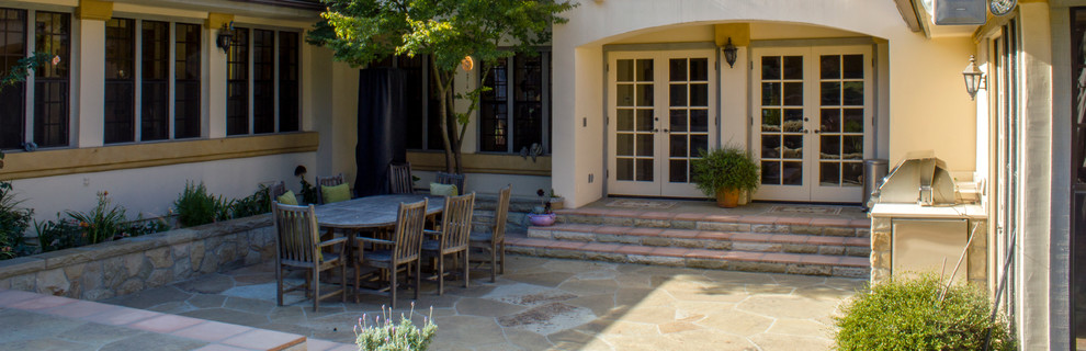 Photo of a medium sized side patio in Santa Barbara with gravel.