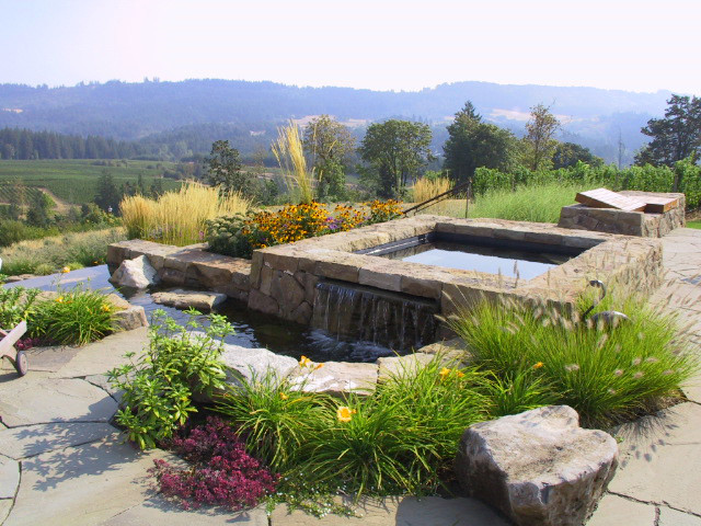 Inspiration for a large traditional full sun backyard landscaping in Portland.