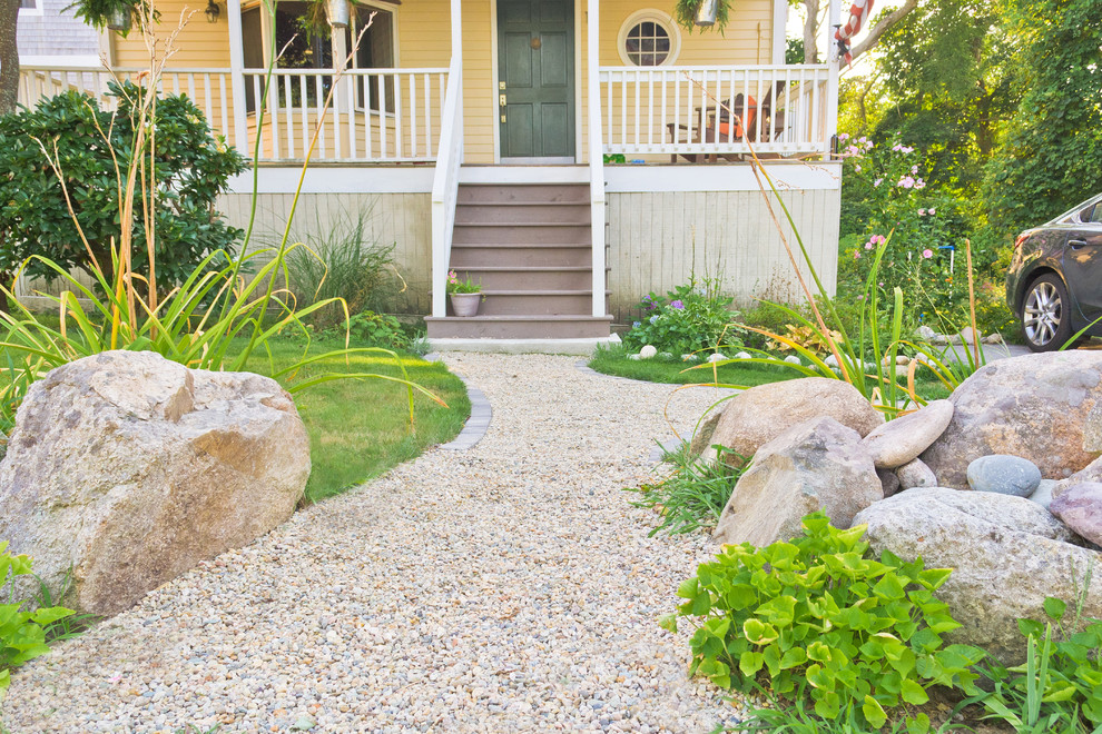Photo of a small coastal front yard gravel driveway in Boston.