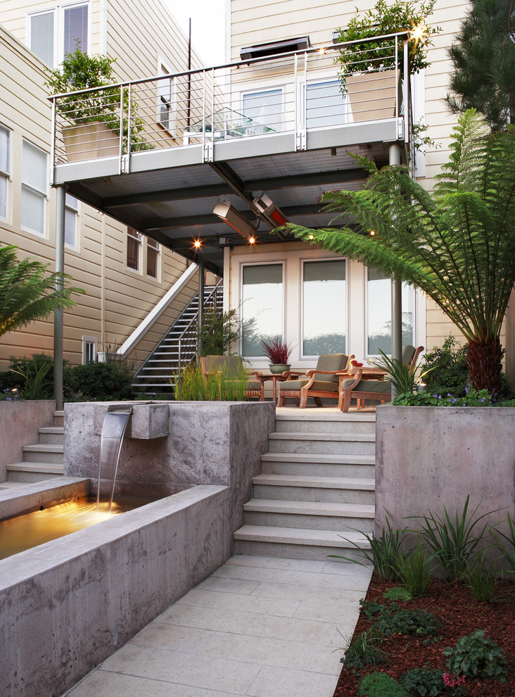 Design ideas for a contemporary garden in San Francisco with a water feature.