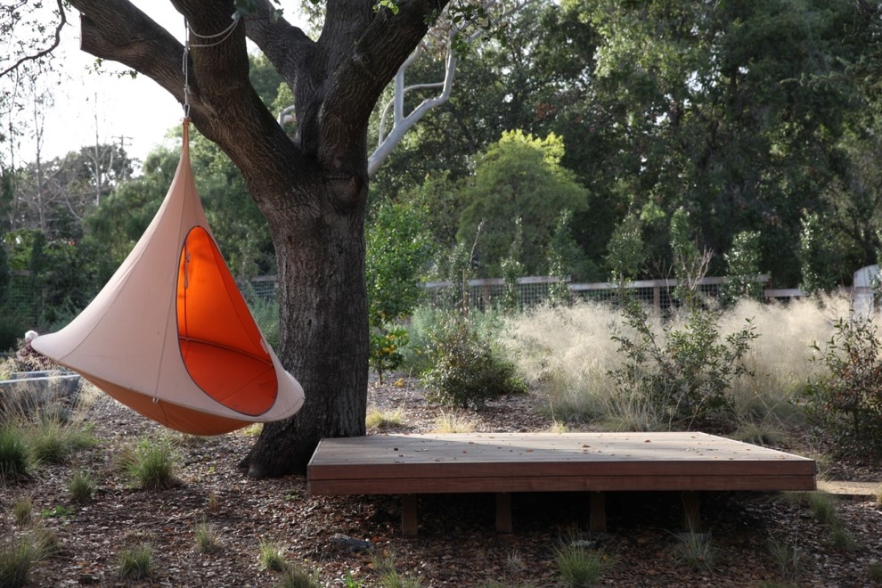 Design ideas for a large contemporary drought-tolerant backyard water fountain landscape in San Francisco.