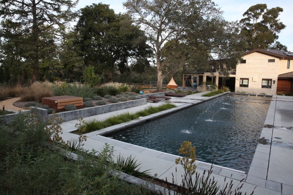 Inspiration for a large contemporary drought-tolerant and full sun backyard gravel water fountain landscape in San Francisco for spring.
