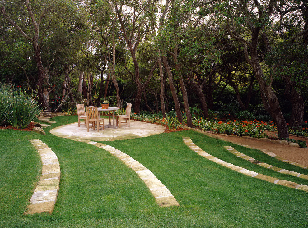 Design ideas for a traditional fully shaded garden steps in Santa Barbara with natural stone paving.