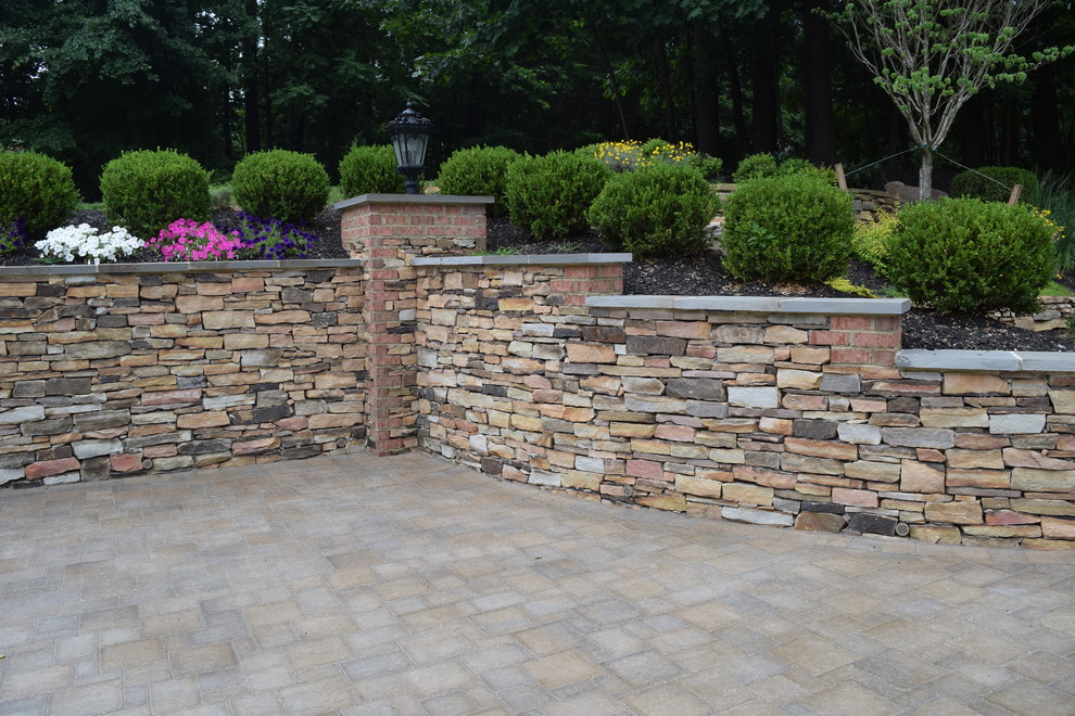 Parking pad Reno, brick retaining wall, stone retaining wall