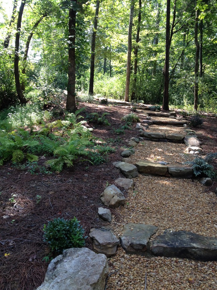 Inspiration for a large rustic sloped formal fully shaded garden for spring in Richmond with a garden path and gravel.