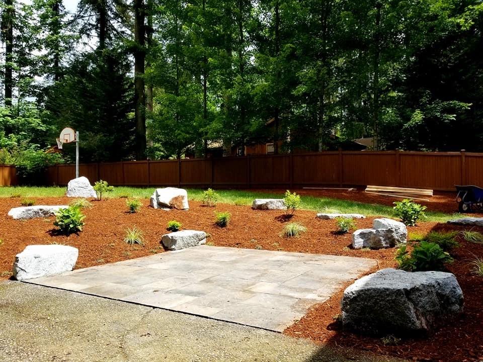 Design ideas for a small traditional back garden in Seattle with concrete paving.
