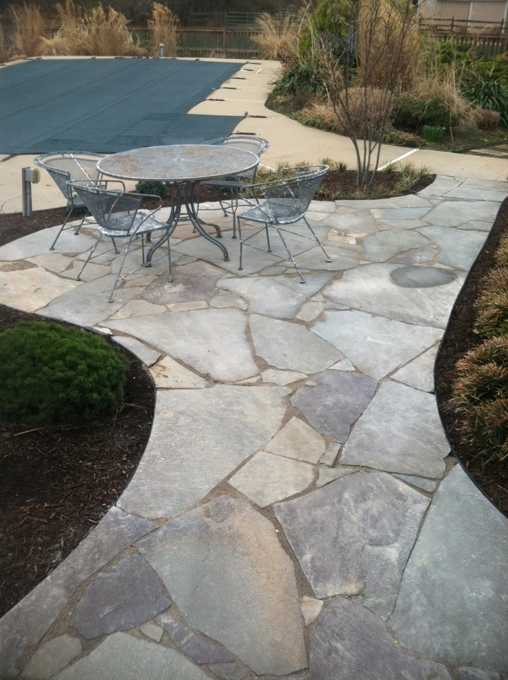 Inspiration for a backyard stone landscaping in DC Metro.
