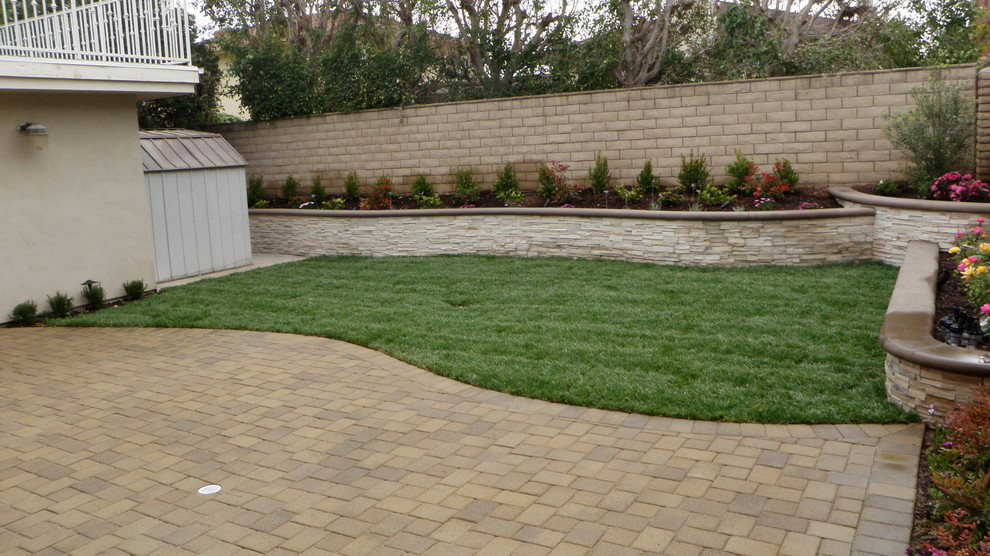 Paver Patio with Stone Veneer Planter Traditional Landscape