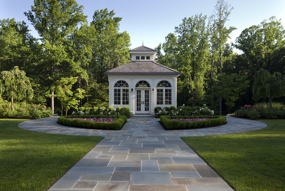 This is an example of a traditional backyard stone landscaping in New York.