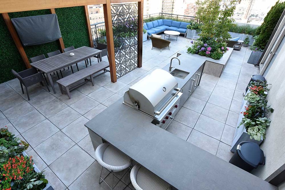 Immagine di un giardino minimal esposto in pieno sole di medie dimensioni e dietro casa con pavimentazioni in cemento