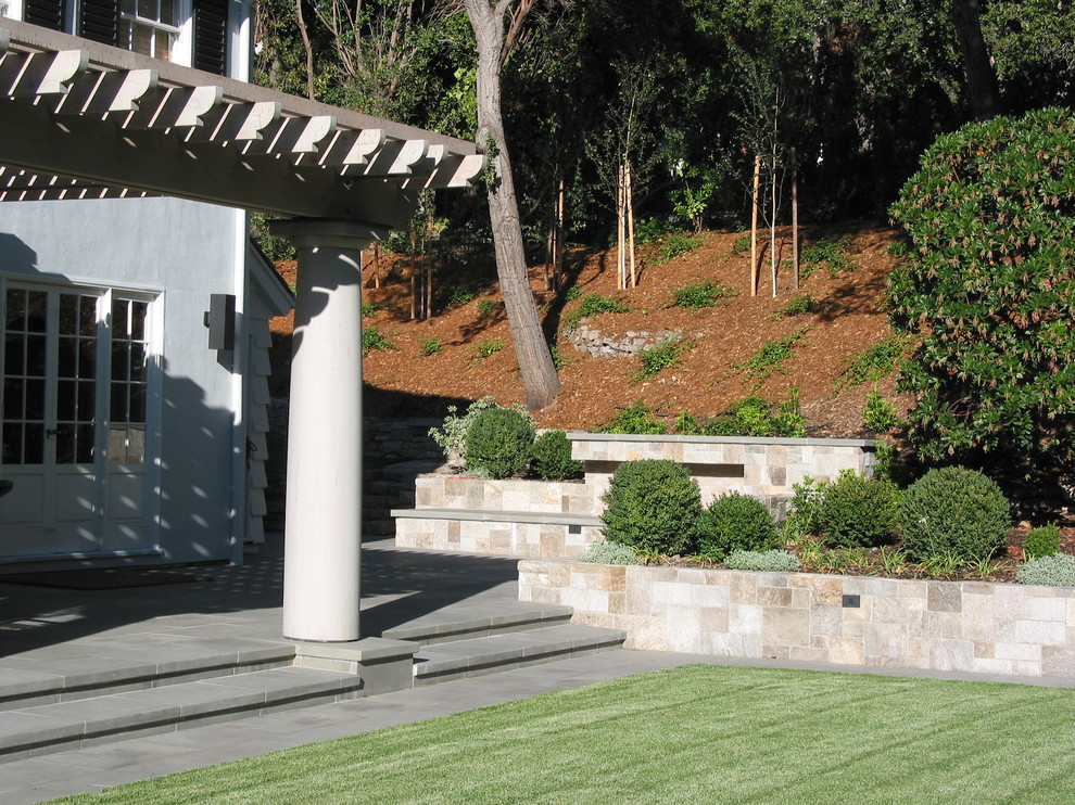 Design ideas for an eclectic stone retaining wall landscape in San Francisco.