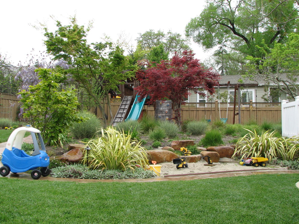 Photo of a large traditional backyard outdoor playset in San Francisco.