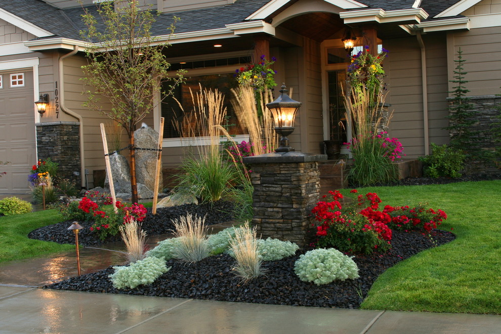 Photo of a mid-sized contemporary full sun front yard concrete paver formal garden in Seattle.