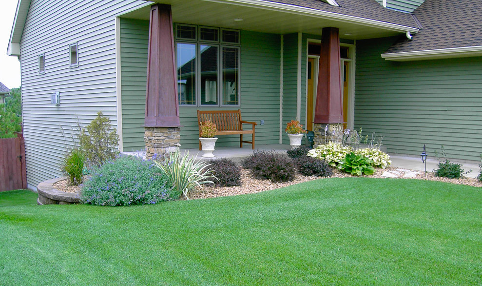 Design ideas for a mid-sized shade front yard stone garden path in Minneapolis.