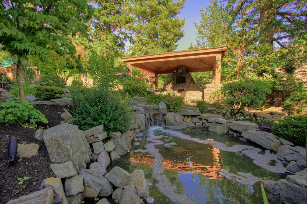 Design ideas for a traditional landscaping in Portland with a fire pit.