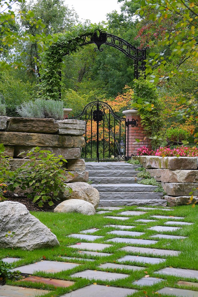 Traditional back garden in Detroit with a garden path.