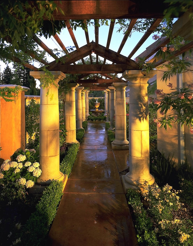 Design ideas for a mediterranean courtyard garden in Other with a water feature.