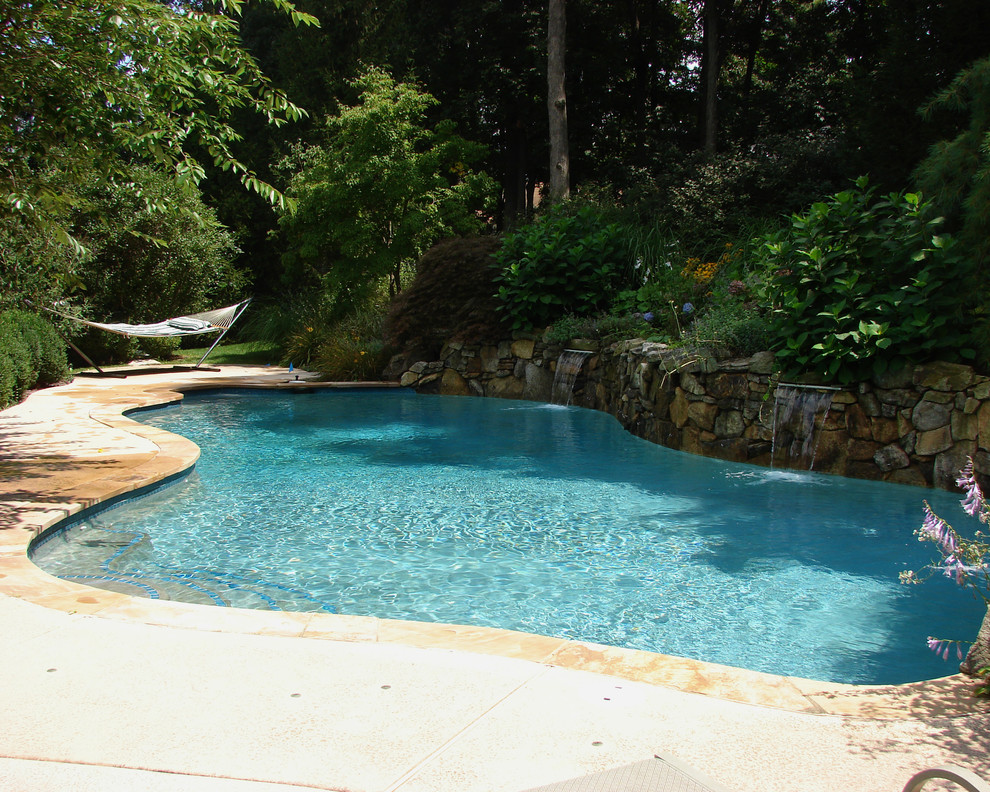 Inspiration for a rustic pool remodel in New York